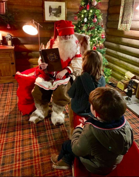 Robbie Williams' children Teddy, Charlie and Coco meet Santa – see photo