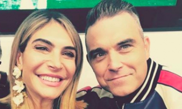 Robbie Williams' children Teddy, Charlie and Coco meet Santa – see photo